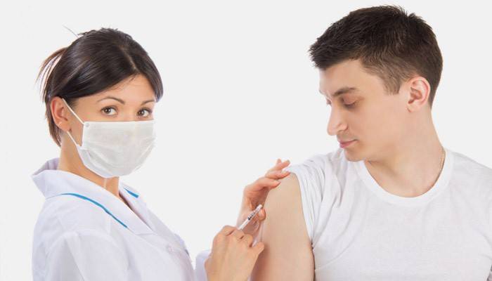 A man receives ADSM vaccination
