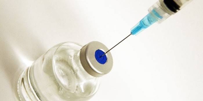 Substance in a bottle and syringe