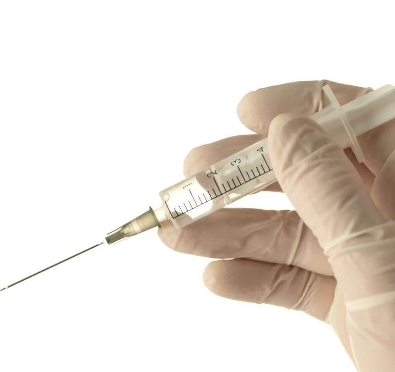 Intramuscular injection: hold the syringe like a pen